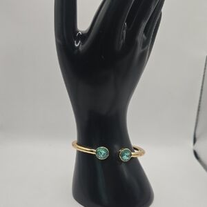 Elegant Gold Bracelet with Blue Stones